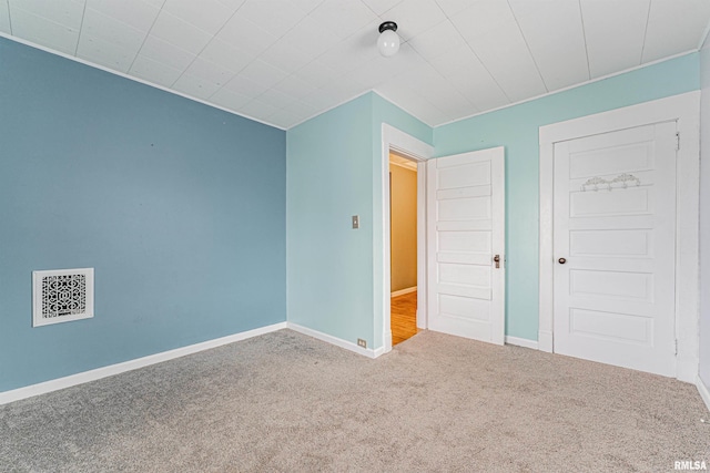 unfurnished bedroom featuring carpet flooring