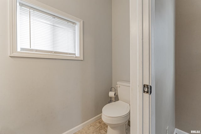 bathroom featuring toilet