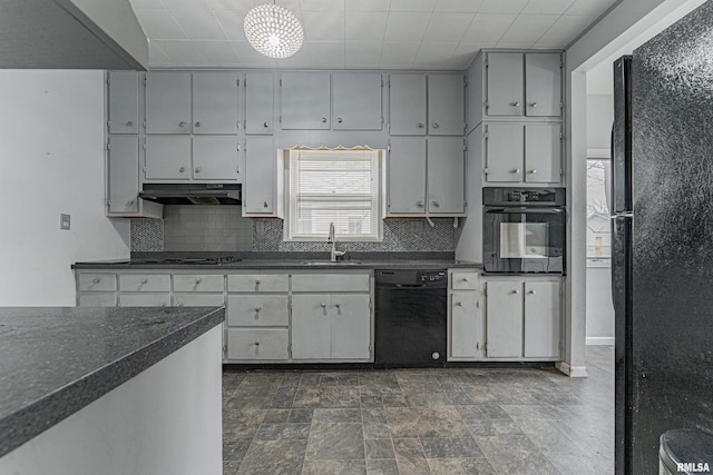 kitchen with backsplash, gray cabinets, sink, and black appliances