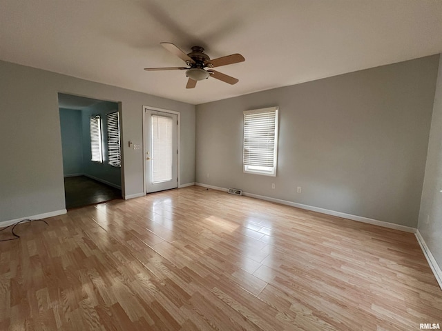 interior space featuring light hardwood / wood-style floors and ceiling fan