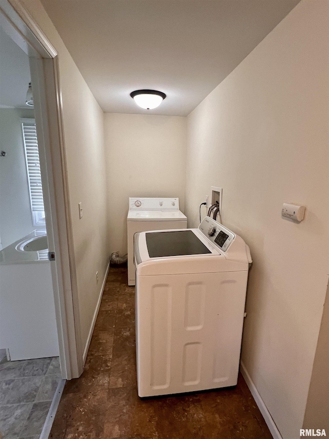 laundry area with washer and clothes dryer