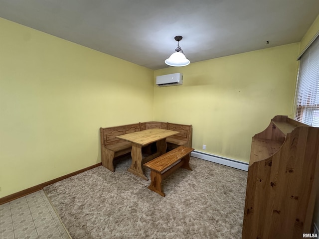 dining space featuring a baseboard radiator and an AC wall unit