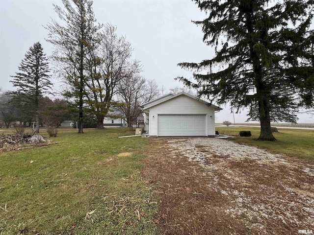 exterior space with an outbuilding and a garage