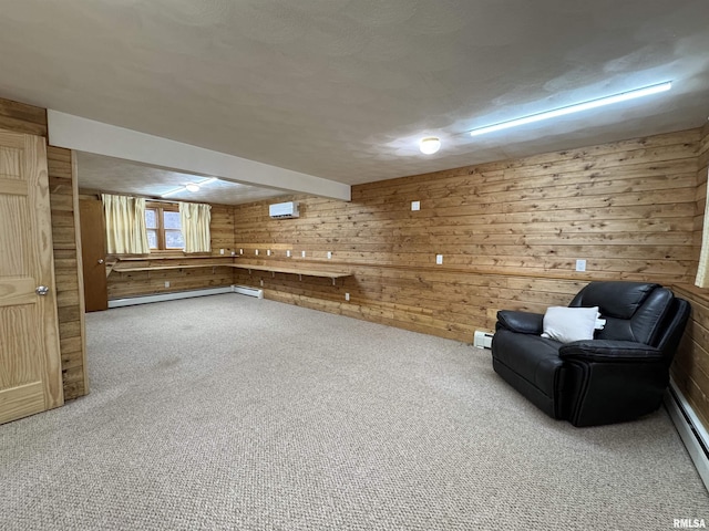 basement featuring carpet floors, baseboard heating, and wooden walls