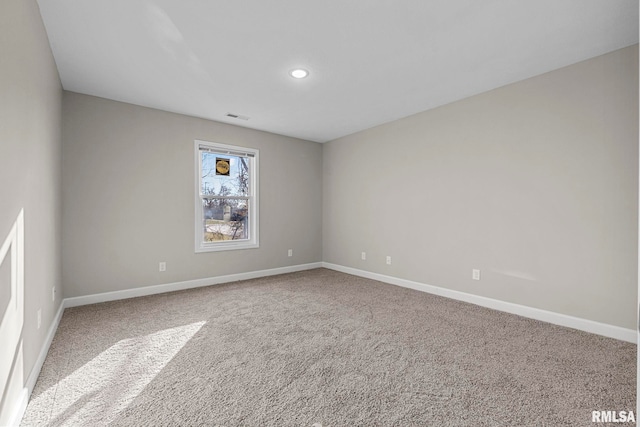 view of carpeted spare room