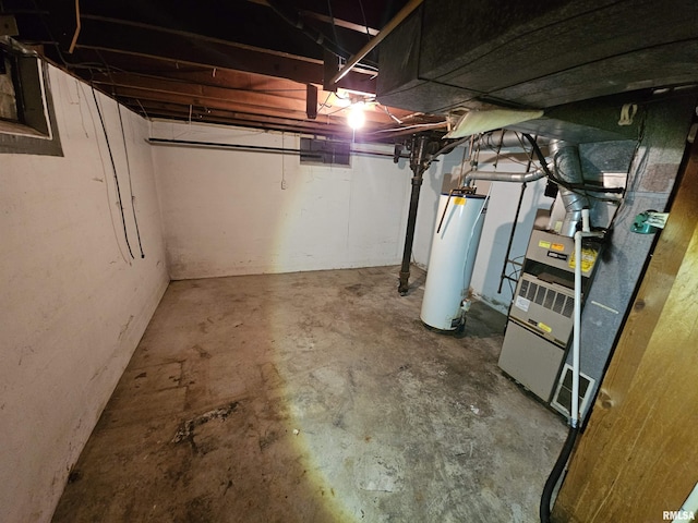 basement with heating unit and water heater