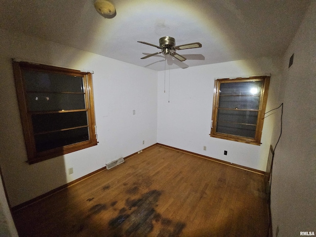 unfurnished room featuring ceiling fan and hardwood / wood-style floors