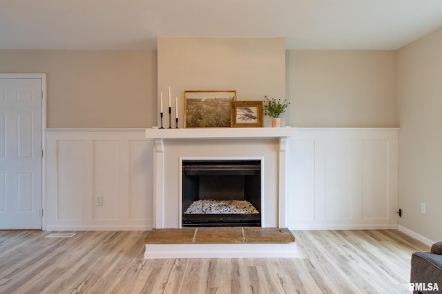 details with hardwood / wood-style floors