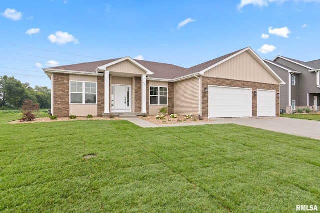 ranch-style home featuring a garage and a front lawn