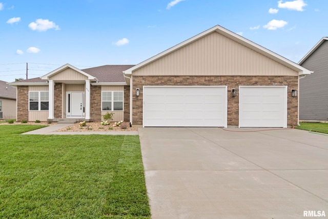 view of front facade featuring a front lawn and a garage