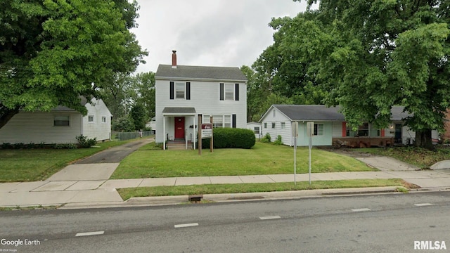 view of front facade with a front yard