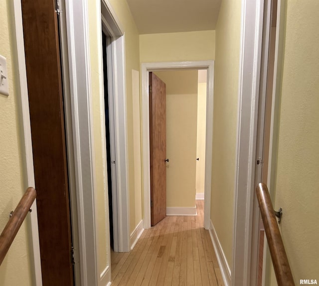 hallway featuring light hardwood / wood-style flooring