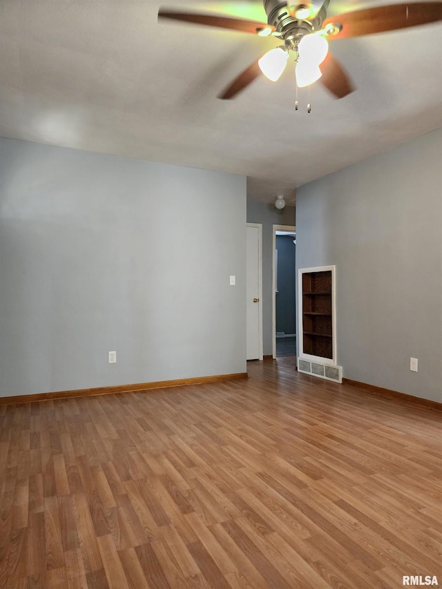 unfurnished living room with ceiling fan and light hardwood / wood-style floors