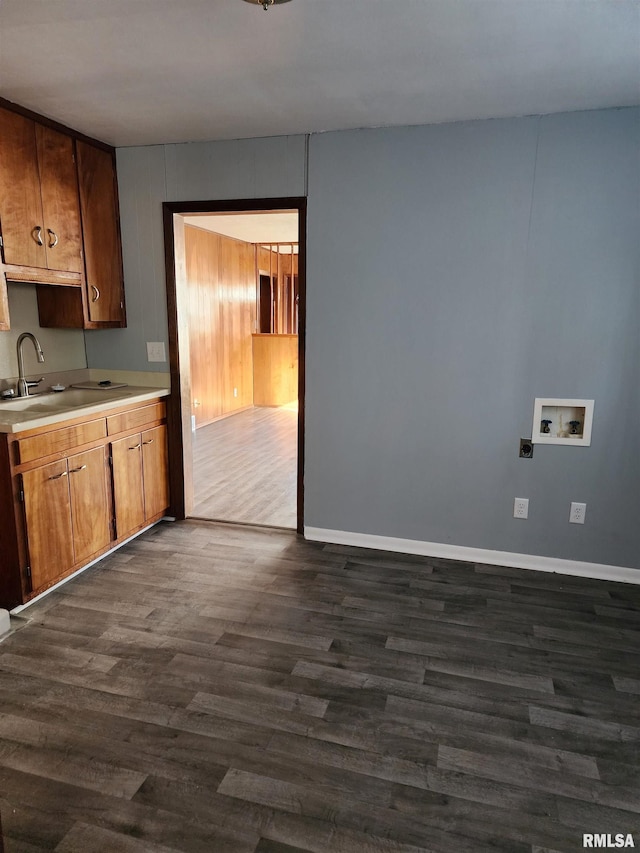 kitchen featuring dark hardwood / wood-style floors and sink