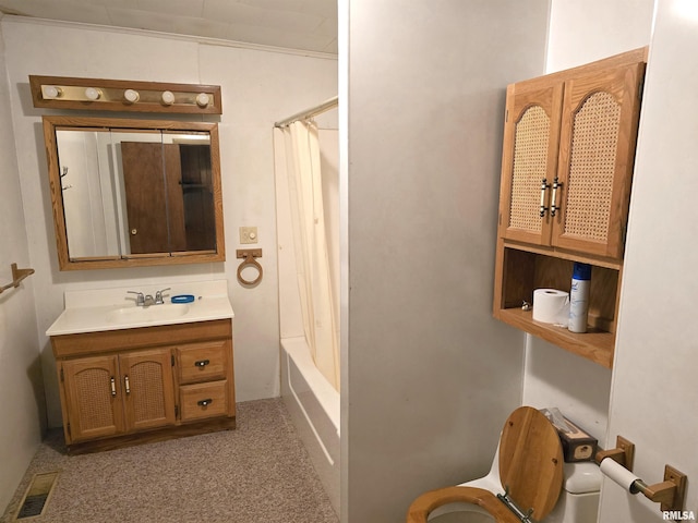 full bathroom featuring vanity, shower / bath combination with curtain, and toilet