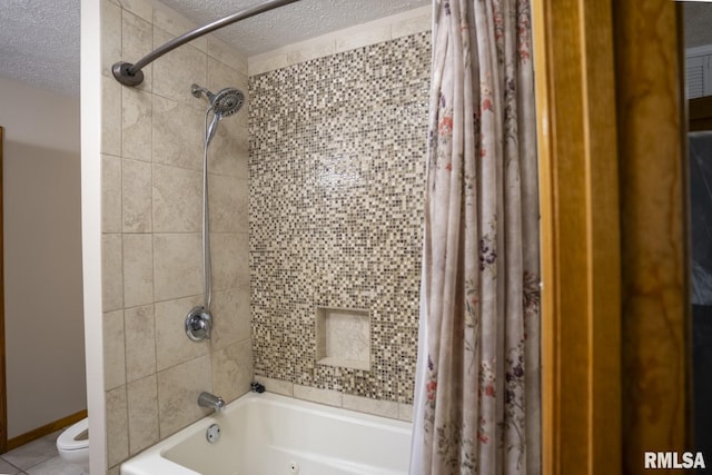 bathroom featuring toilet, a textured ceiling, and shower / tub combo with curtain