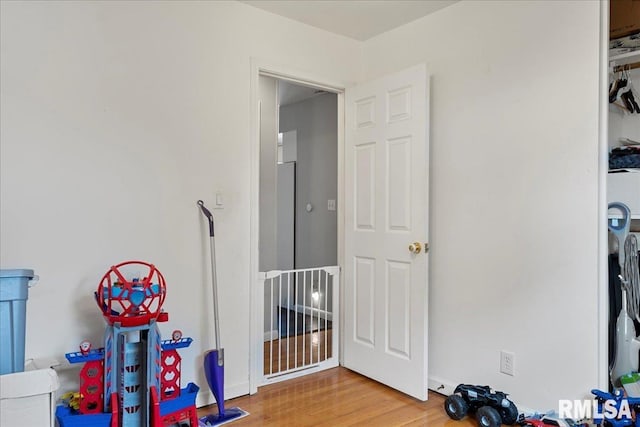 recreation room featuring light hardwood / wood-style flooring