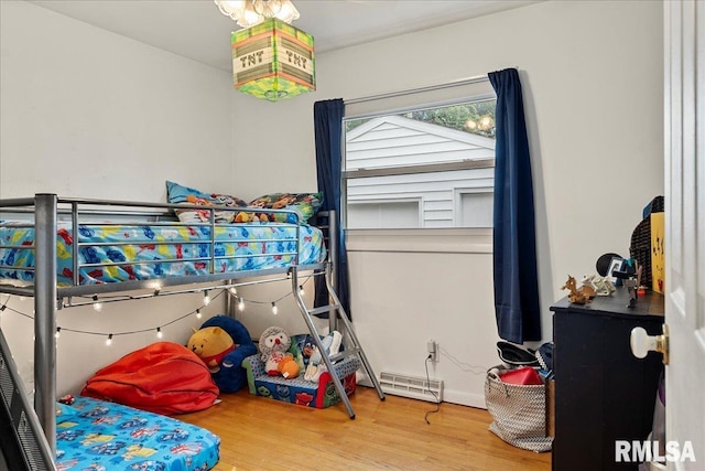 bedroom featuring wood-type flooring