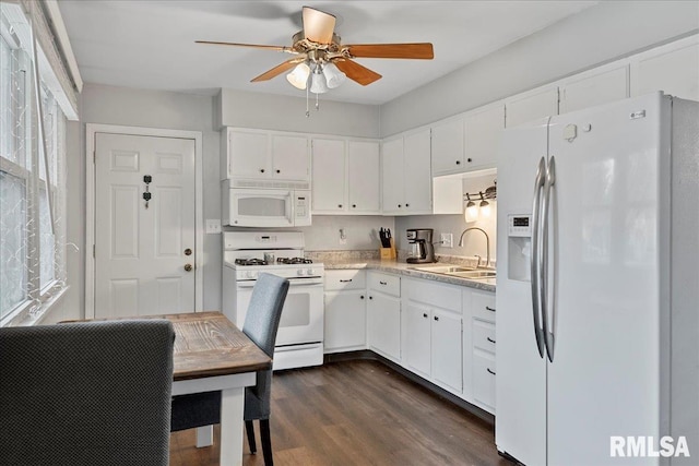 kitchen featuring white cabinetry, sink, ceiling fan, dark wood-type flooring, and white appliances