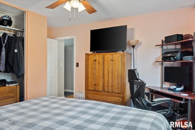 bedroom featuring ceiling fan and a closet