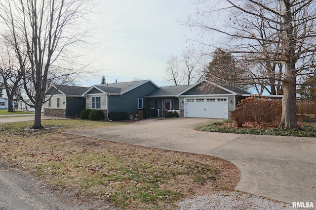 ranch-style house featuring a garage