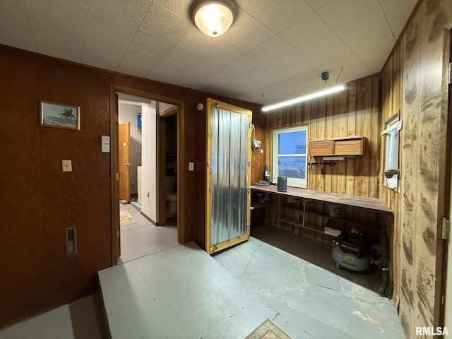 kitchen with wood walls