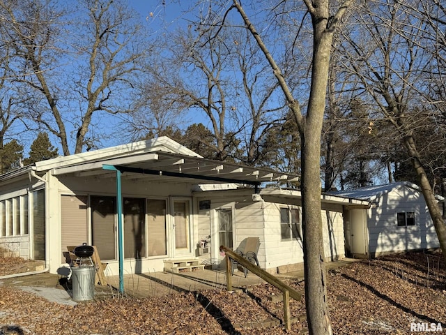 view of front facade with a patio area