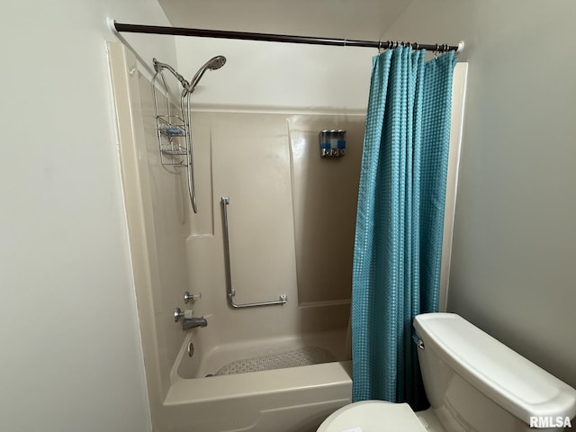 bathroom featuring toilet and shower / bathtub combination with curtain