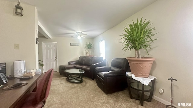 living room with ceiling fan and light carpet