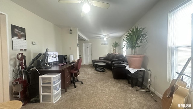 carpeted office featuring ceiling fan