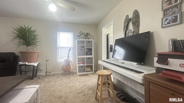 miscellaneous room with light carpet and ceiling fan