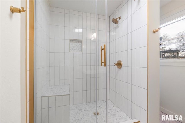 bathroom featuring an enclosed shower