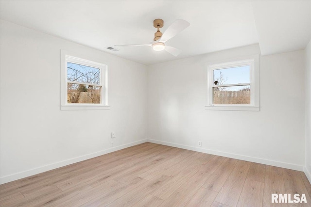 unfurnished room with light hardwood / wood-style floors and ceiling fan