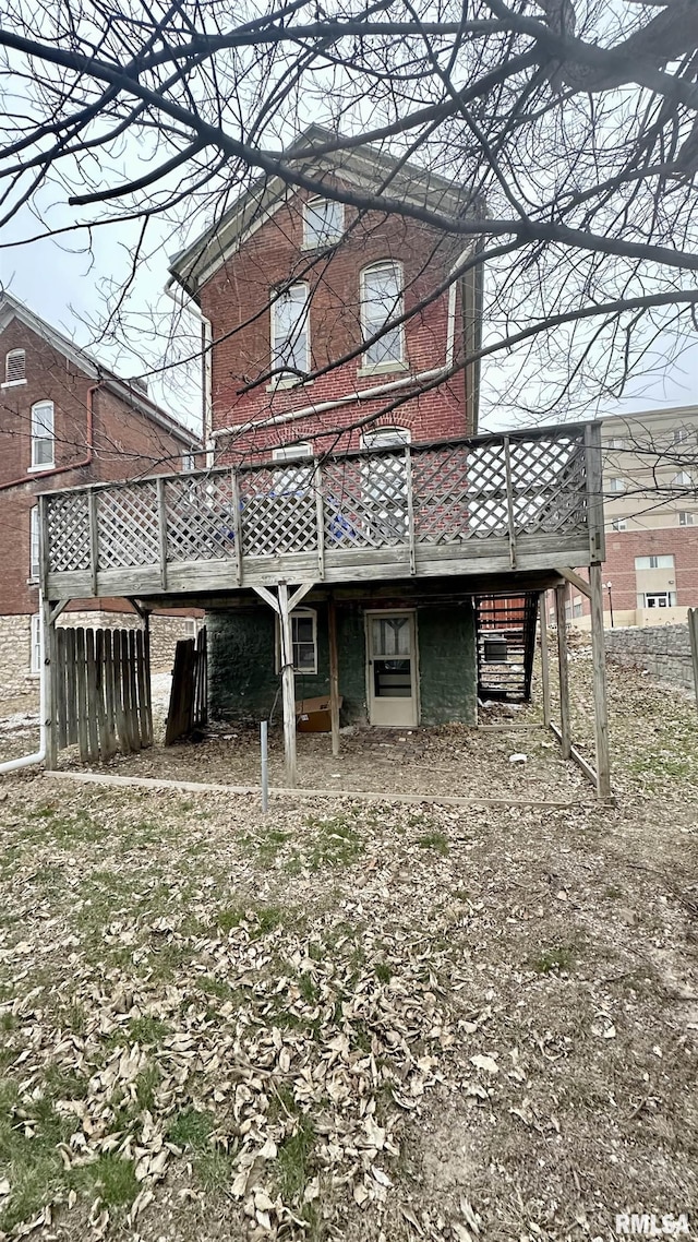 rear view of house with a deck