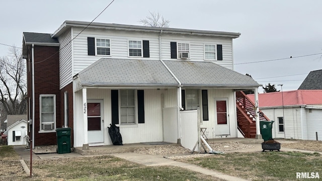 front facade featuring cooling unit