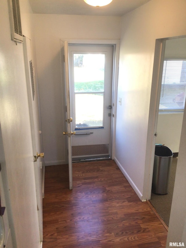 doorway to outside with dark hardwood / wood-style floors