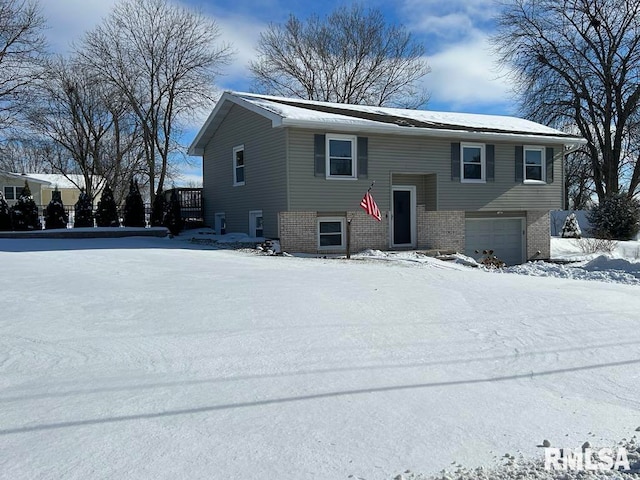 raised ranch with a garage