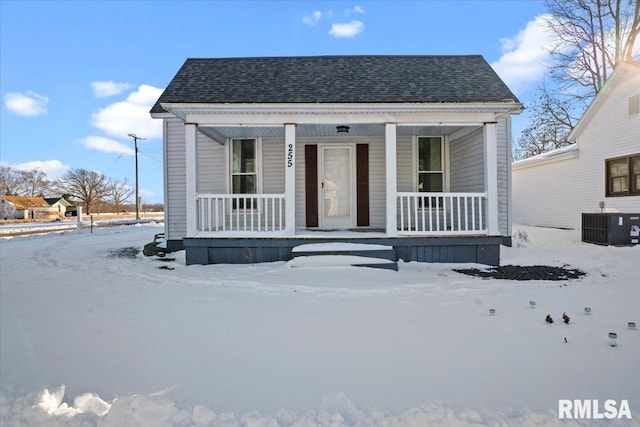 view of front of property featuring a porch and central AC unit