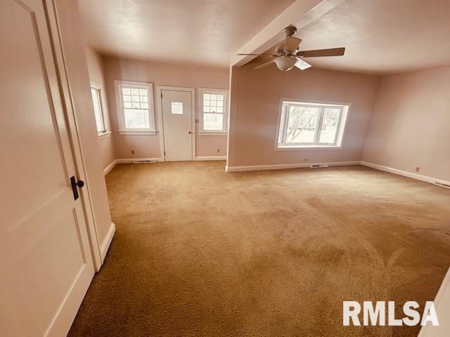 interior space featuring ceiling fan