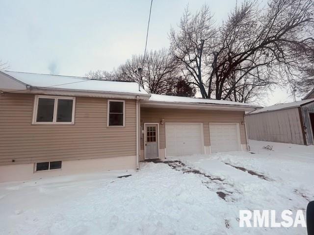 view of front of house with a garage