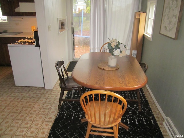 dining space featuring a healthy amount of sunlight