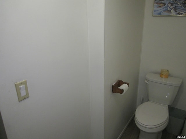 bathroom featuring toilet