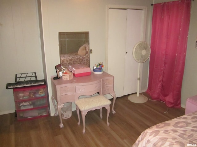 bedroom featuring dark wood-type flooring