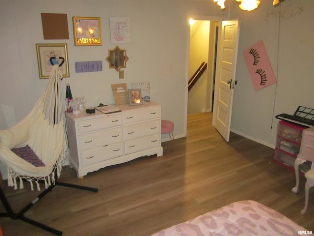 bedroom featuring dark hardwood / wood-style flooring