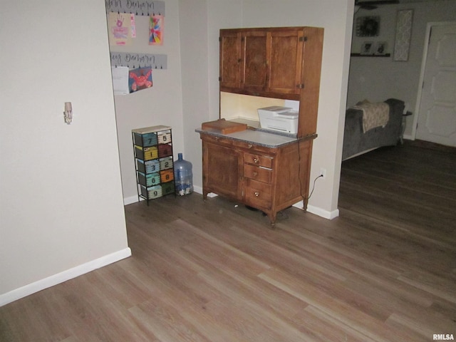 kitchen with dark hardwood / wood-style floors