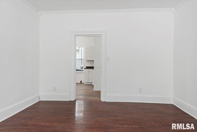 unfurnished room featuring crown molding and dark hardwood / wood-style floors