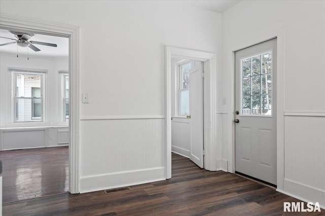 entrance foyer with dark hardwood / wood-style floors and ceiling fan