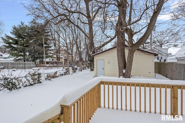 view of snow covered deck