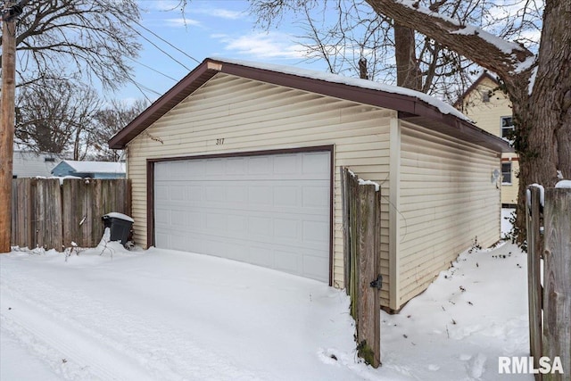 view of snow covered garage