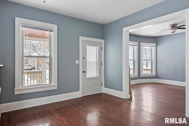 entryway with ceiling fan, dark hardwood / wood-style flooring, and a wealth of natural light